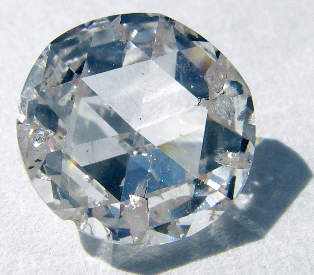 Example of a diamond's strength and rigidity compared to beryllium's strength-to-weight ratio. 