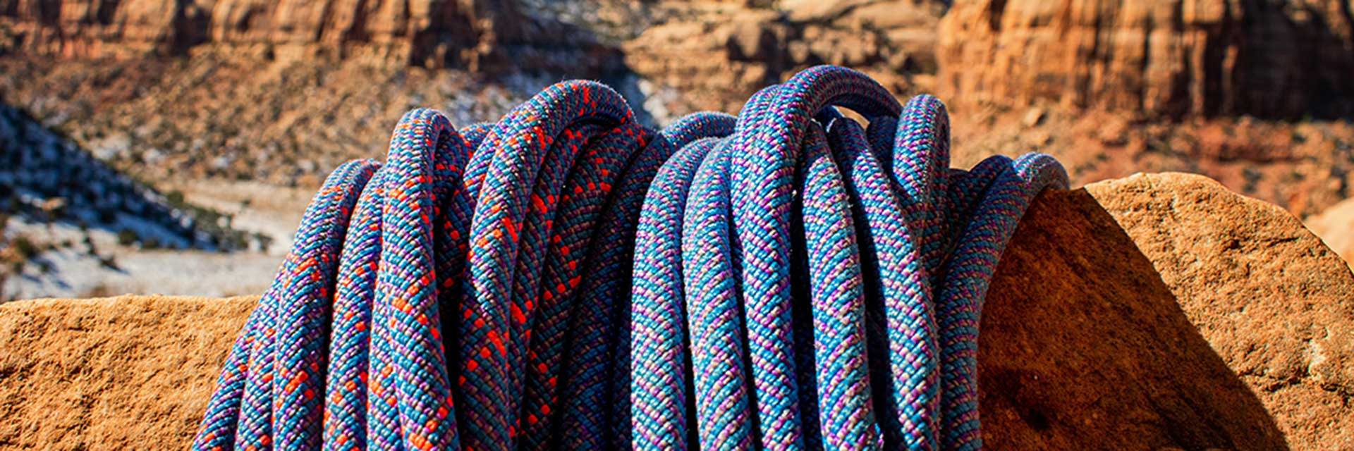 image of ropes laying on red rocks
