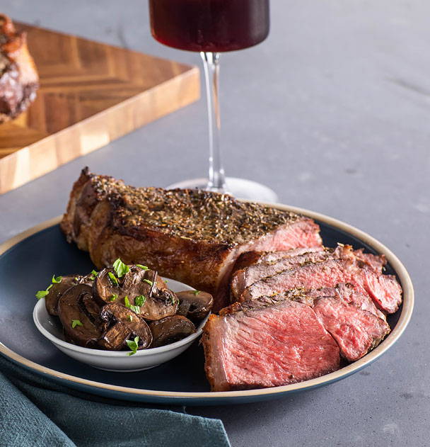 Gateway to rosemary and thyme strip steaks with mushrooms recipe