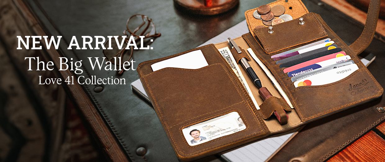 New arrival: The Big Wallet, showcasing cards and a pen on a table.