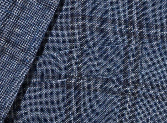 Close-up of blue plaid fabric texture.