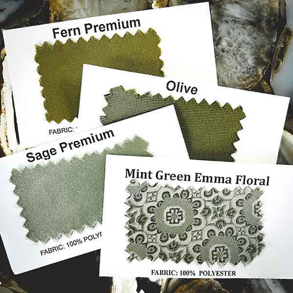 An assortment of green fabric color swatches