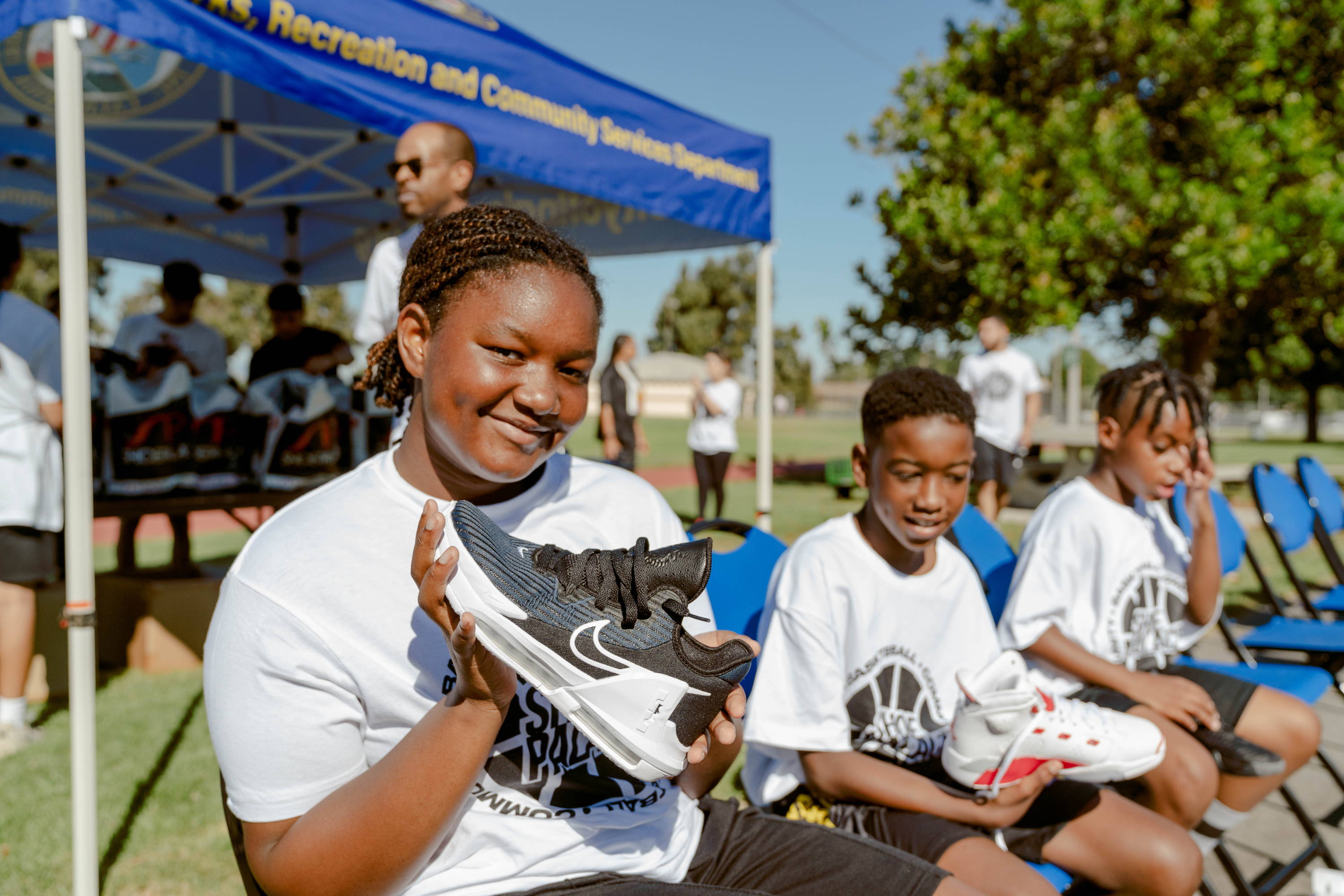 darby park hoop clinic girl showing off shoes