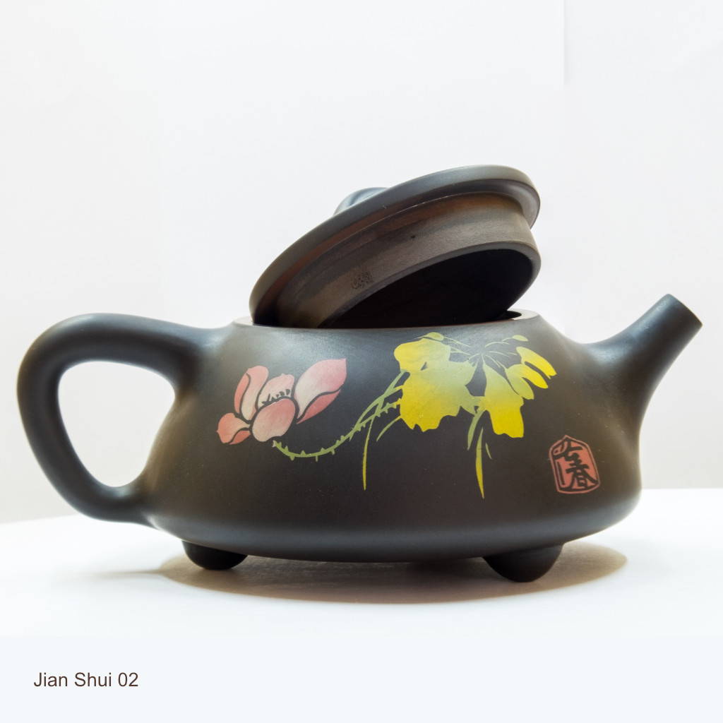 Jian Shui Teapot with inlaid clay design