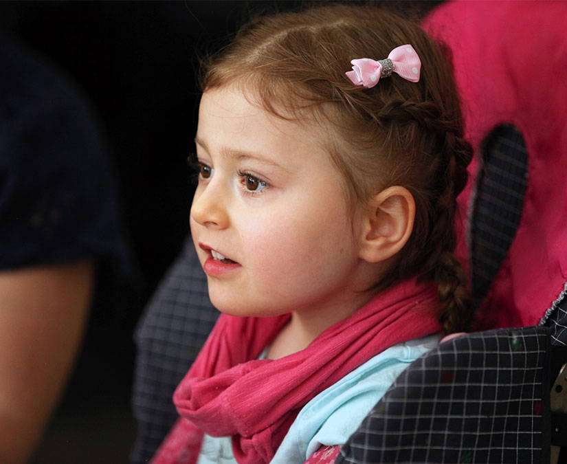 Young girl with Rett syndrome who uses Tobii Dynavox solutions