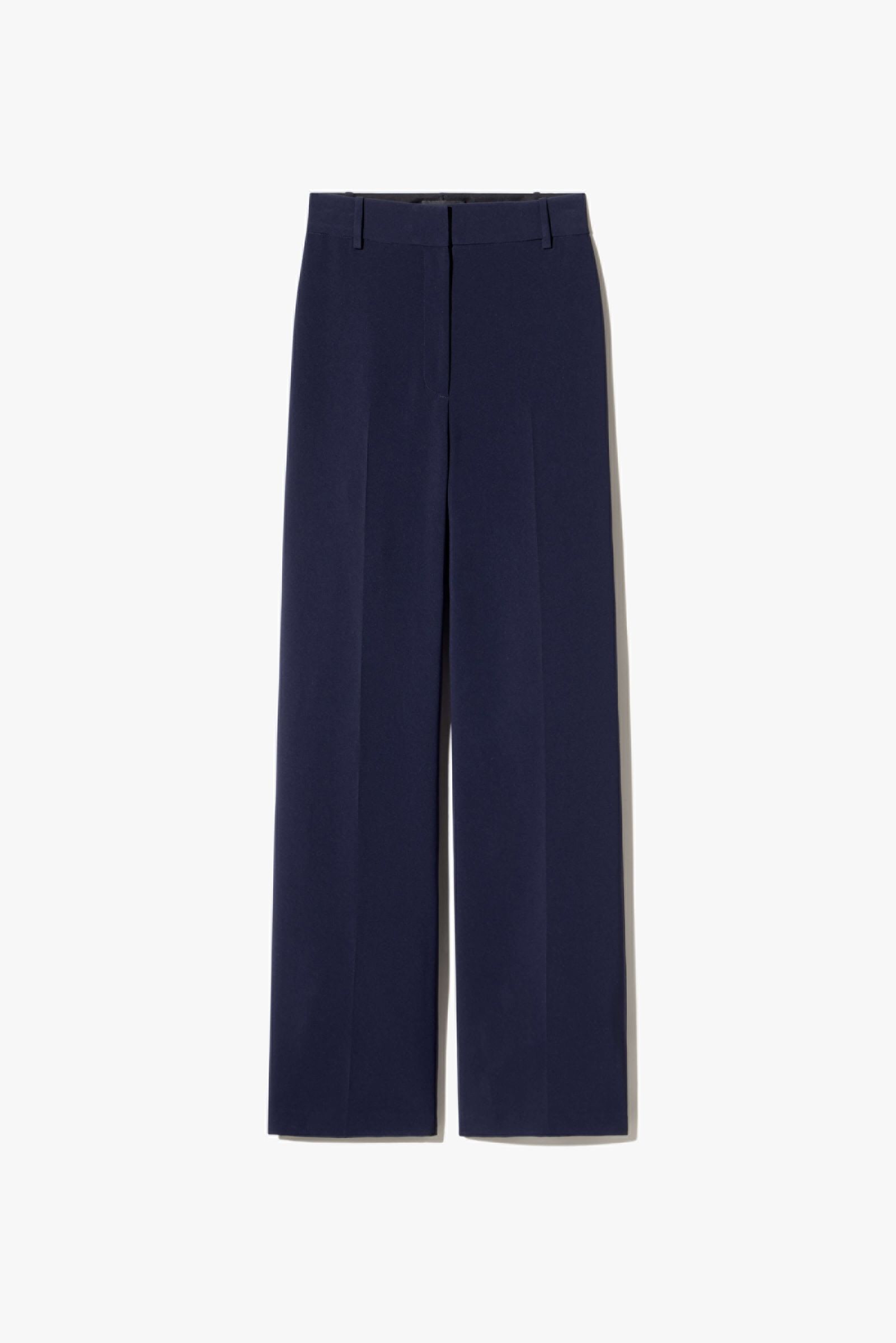 Navy blue wide-leg trousers on a white background.