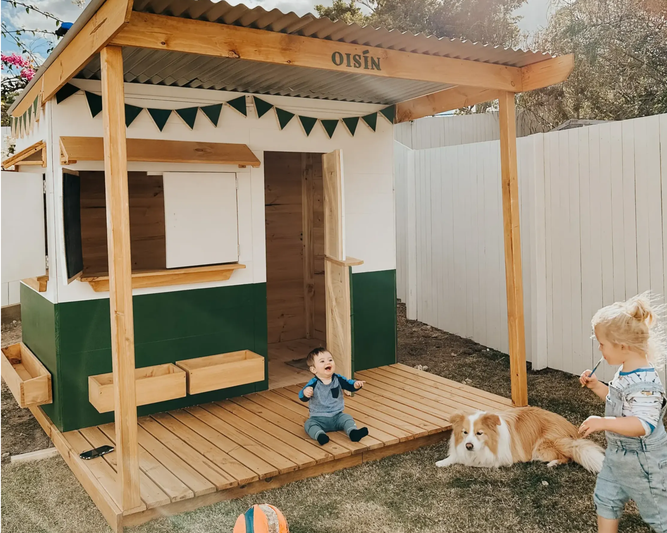 Kids having a play time at an extended cubby house