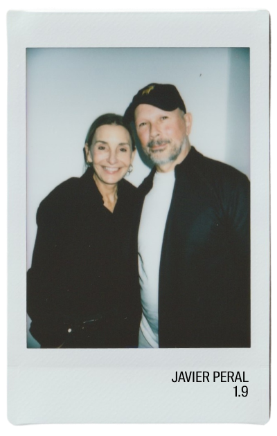 Two people smiling together in a polaroid photo.