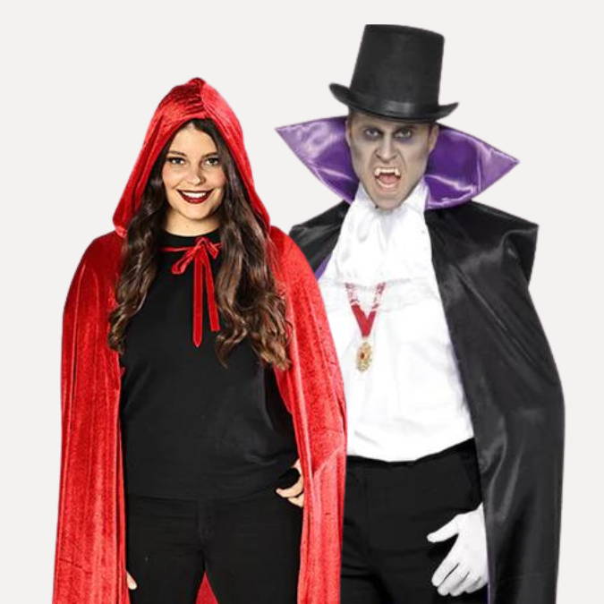 Woman in red cape and man in black vampire cape. Shop all capes.