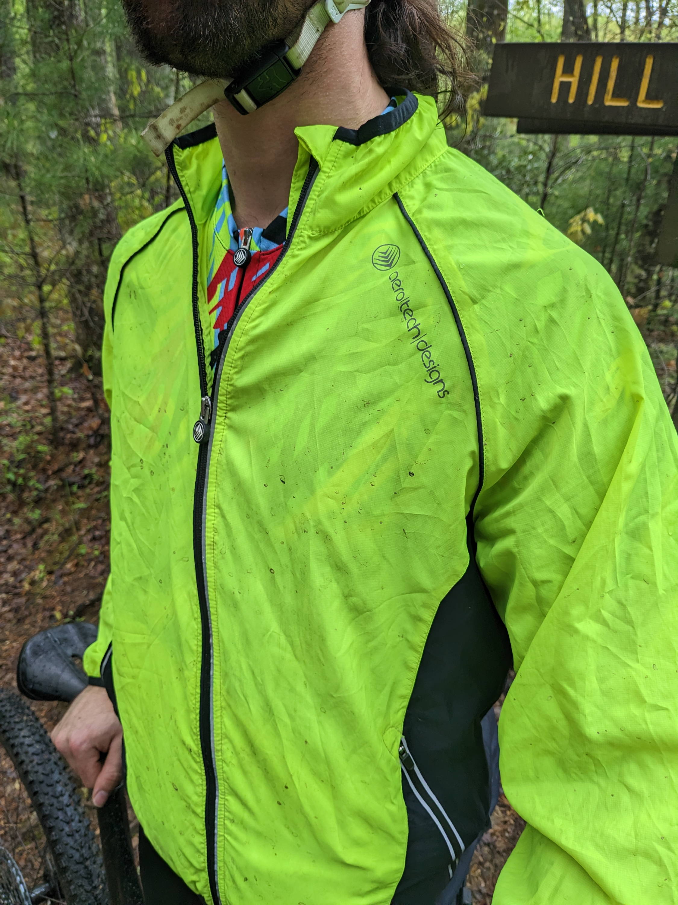 Cycling in an Aero Tech Designs jacket.  Mud on it.