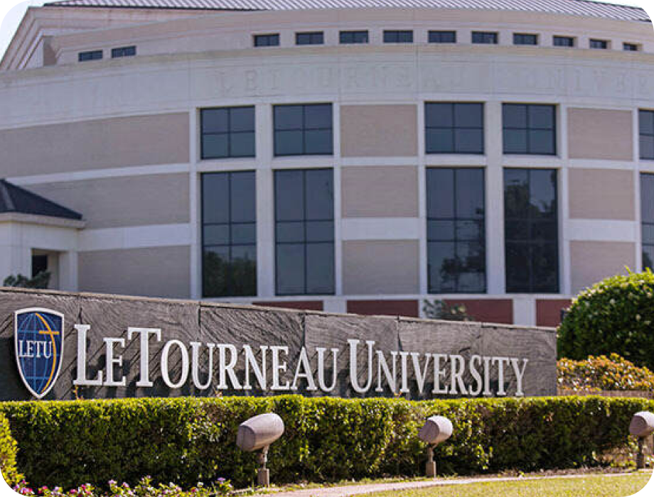 Sign for LeTourneau University in front of the campus building.