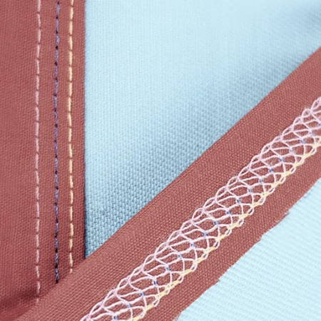 coverlock stitches on the front and backside of a garment