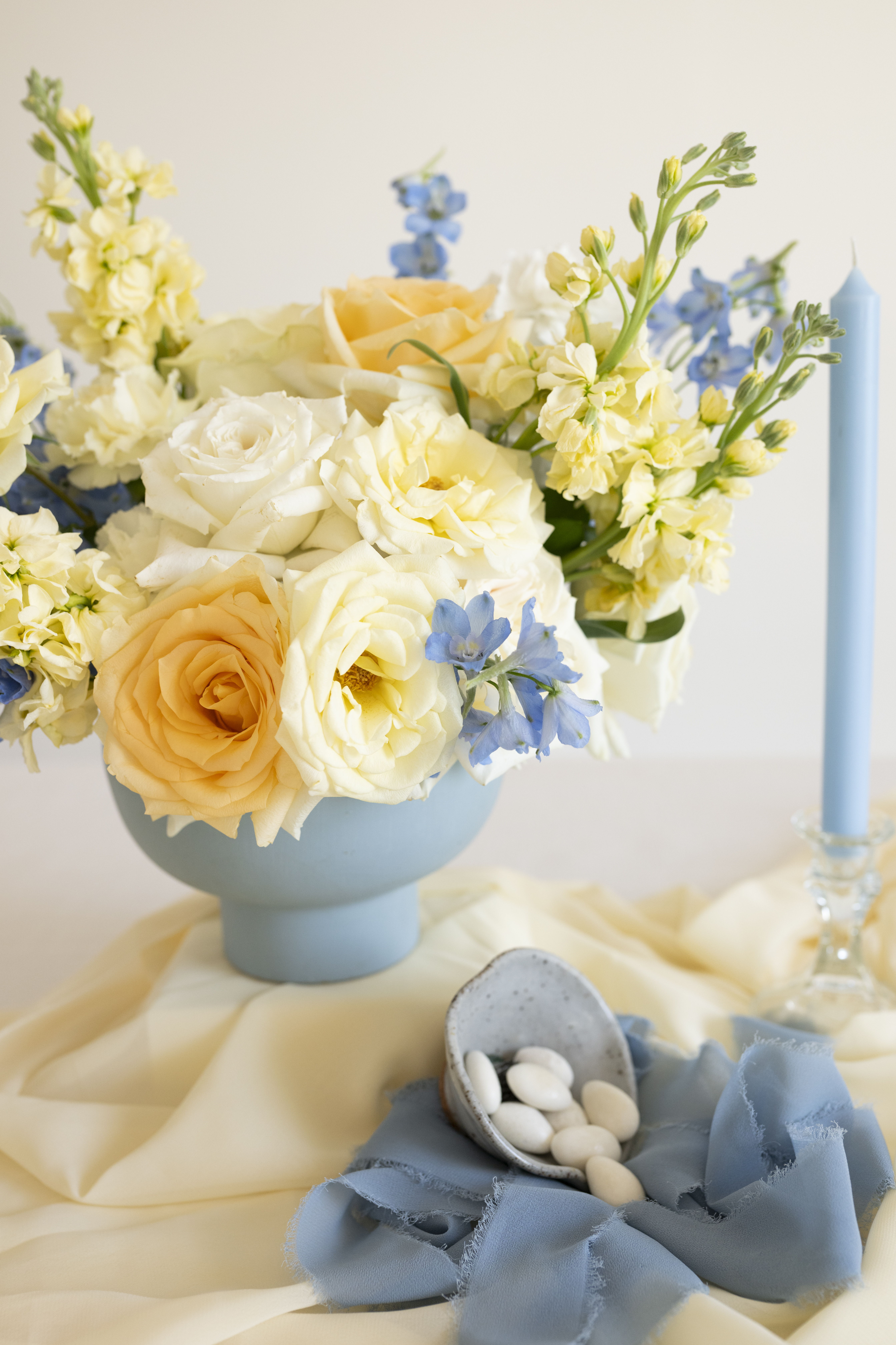 blue and buttercream compote centerpiece