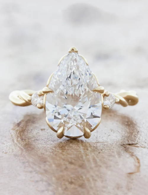pear diamond three stone ring