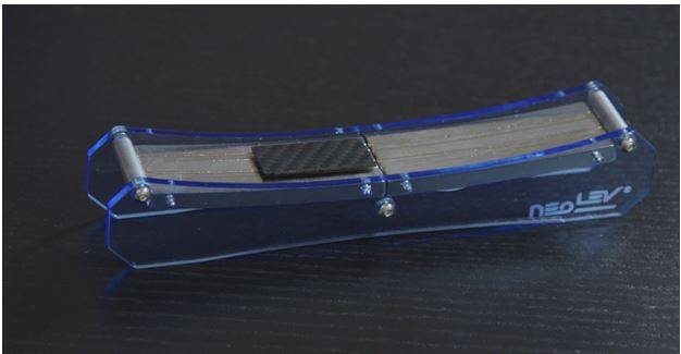Pyrolytic carbon levitates on the strong magnets.