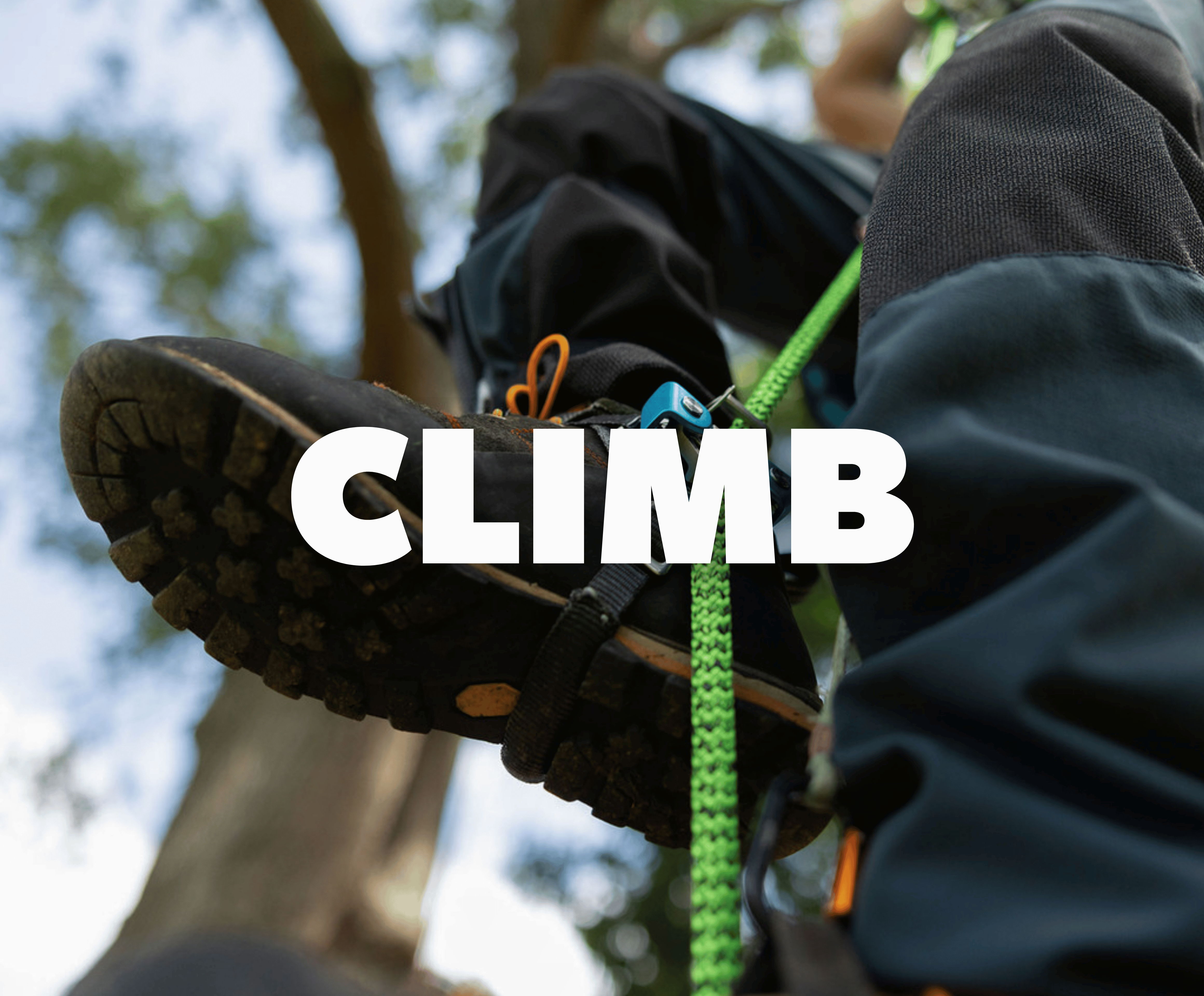 A person's foot in climbing gear with the text 