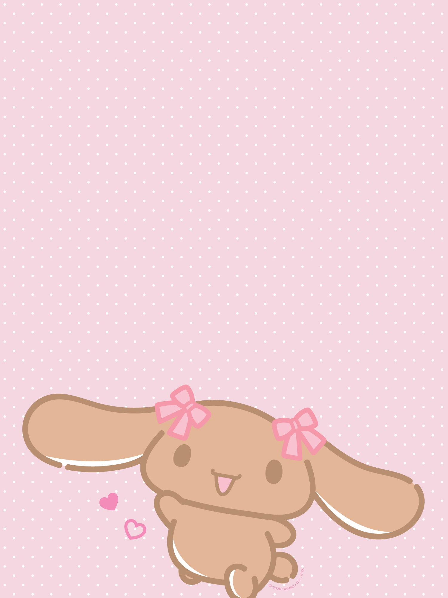 Lovelymocha with pink bows on a pink polka dot background.