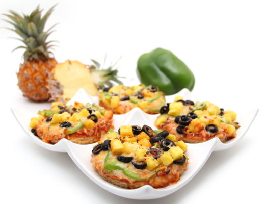 mini pizzas with olives pineapple and bell peppers