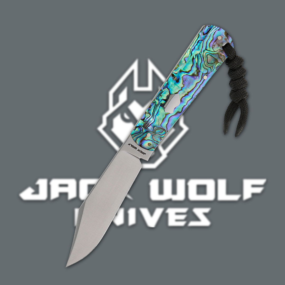 Colorful folding knife with a silver blade and paracord lanyard.