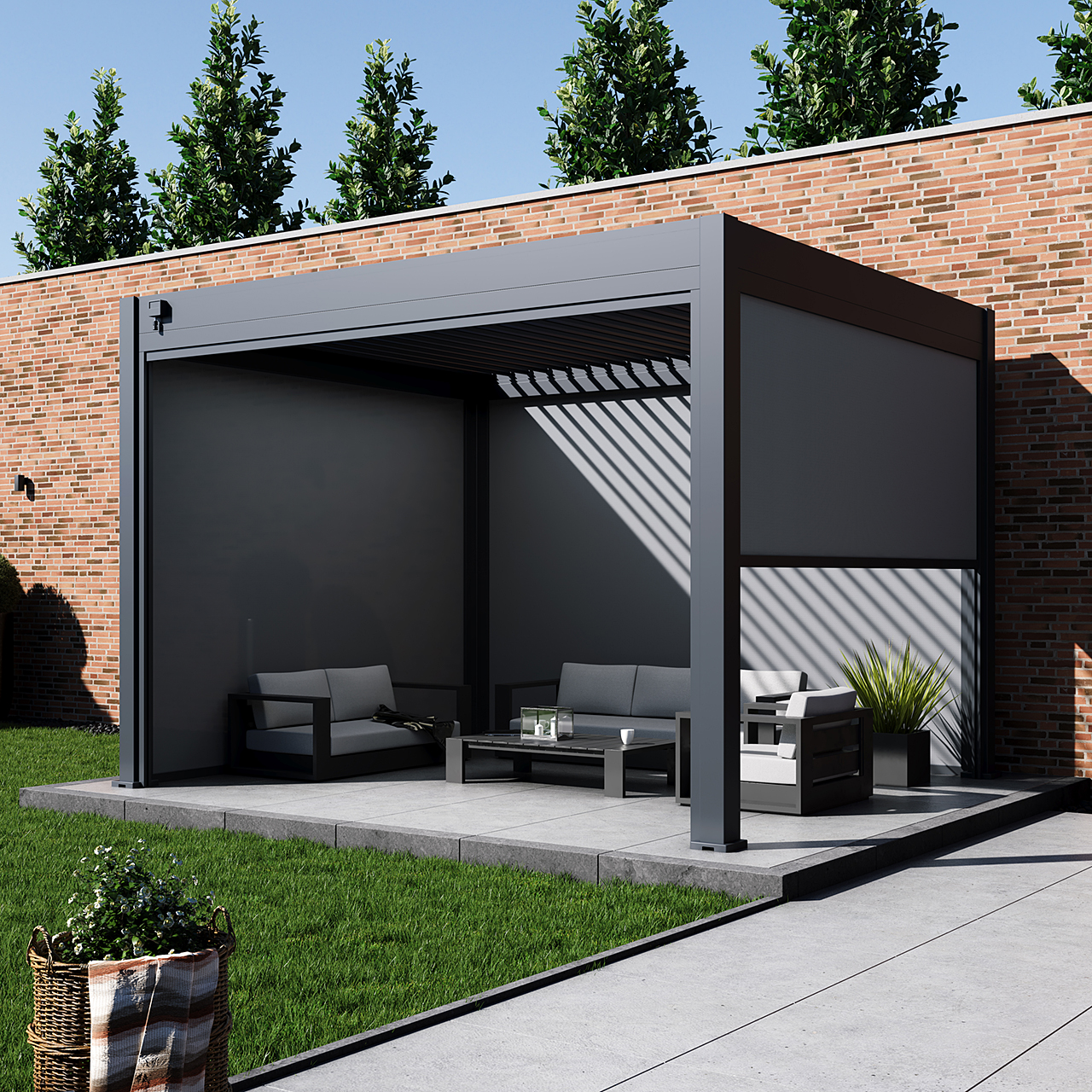 Modern outdoor lounge area with seating and decorative plants.
