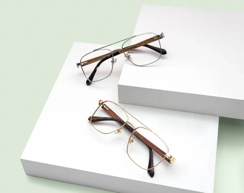 flatlay of eyeglasses on a white background