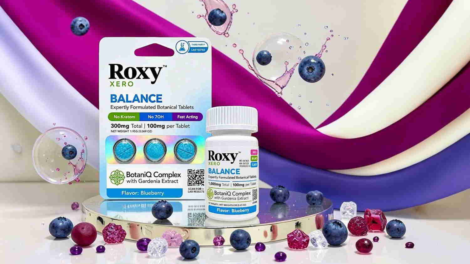 Roxy Balance dietary supplement with colorful decorative beads and fabric background.