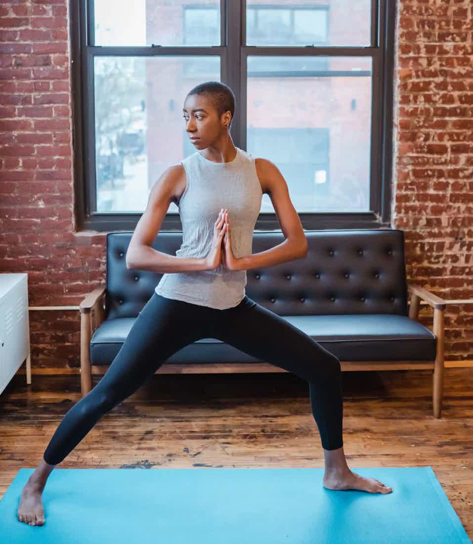 Woman doing yoga at home
