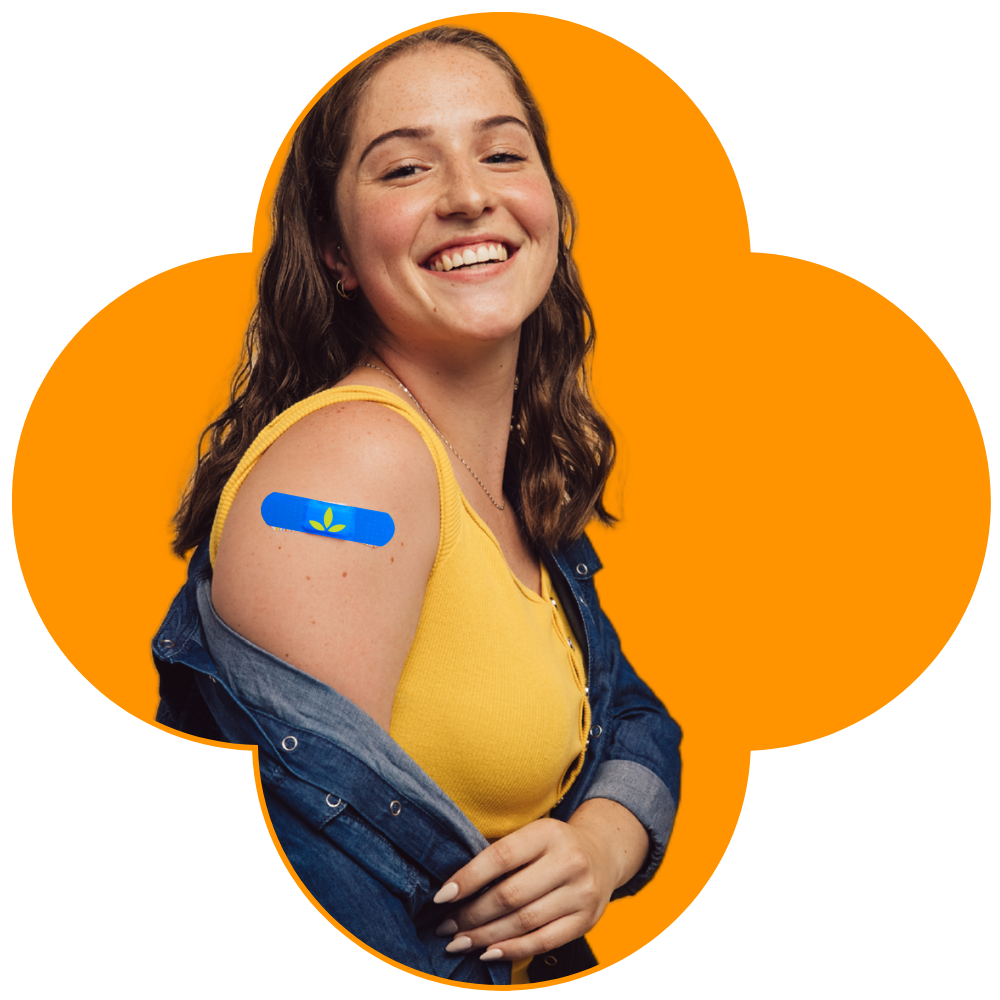 Young woman smiling after receiving her flu vaccination 
