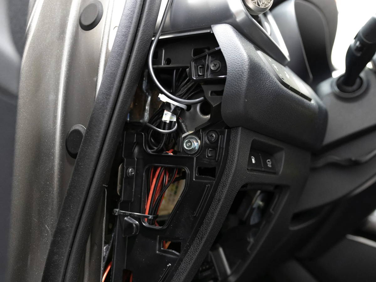 Vehicle panel opened for clean dash cam wiring
