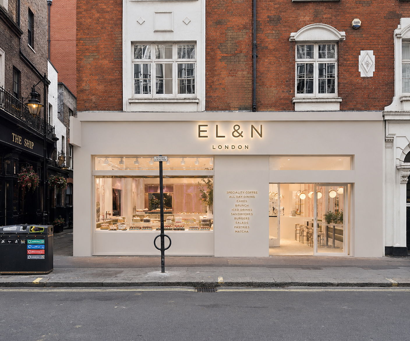 Exterior view of EL&N café with large windows and a light facade.