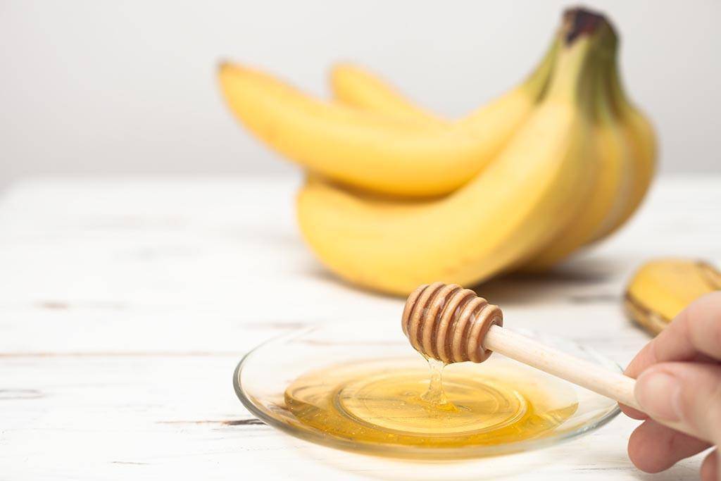 Blend a banana with 1 tablespoon of honey, 1 tablespoon of olive oil and an...