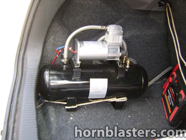 Under-hood or mounting detail for Shocker XL train horns on 2002 Ford Focus HornBlasters gallery photo 8