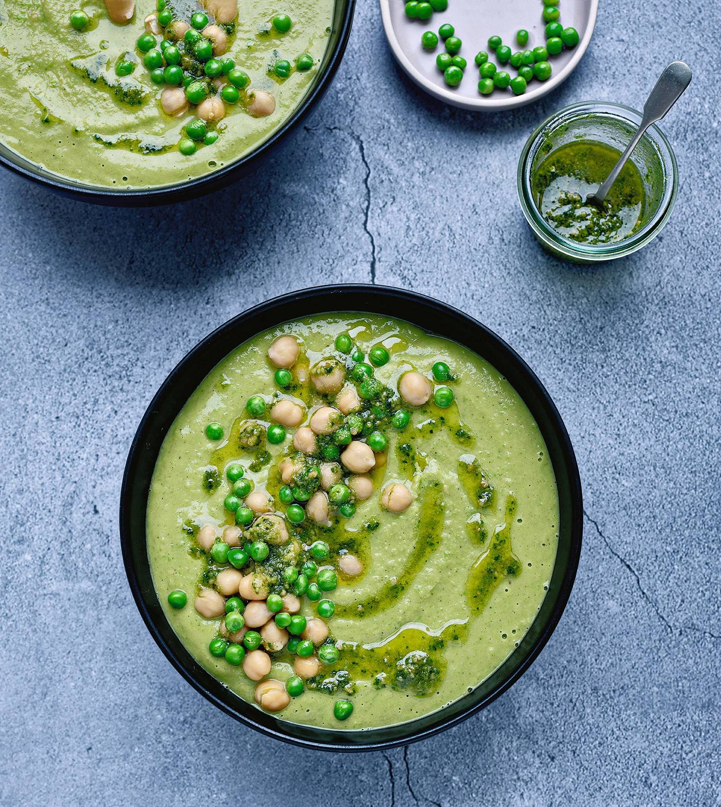 Bowl Of Green Soup In Black Bowl