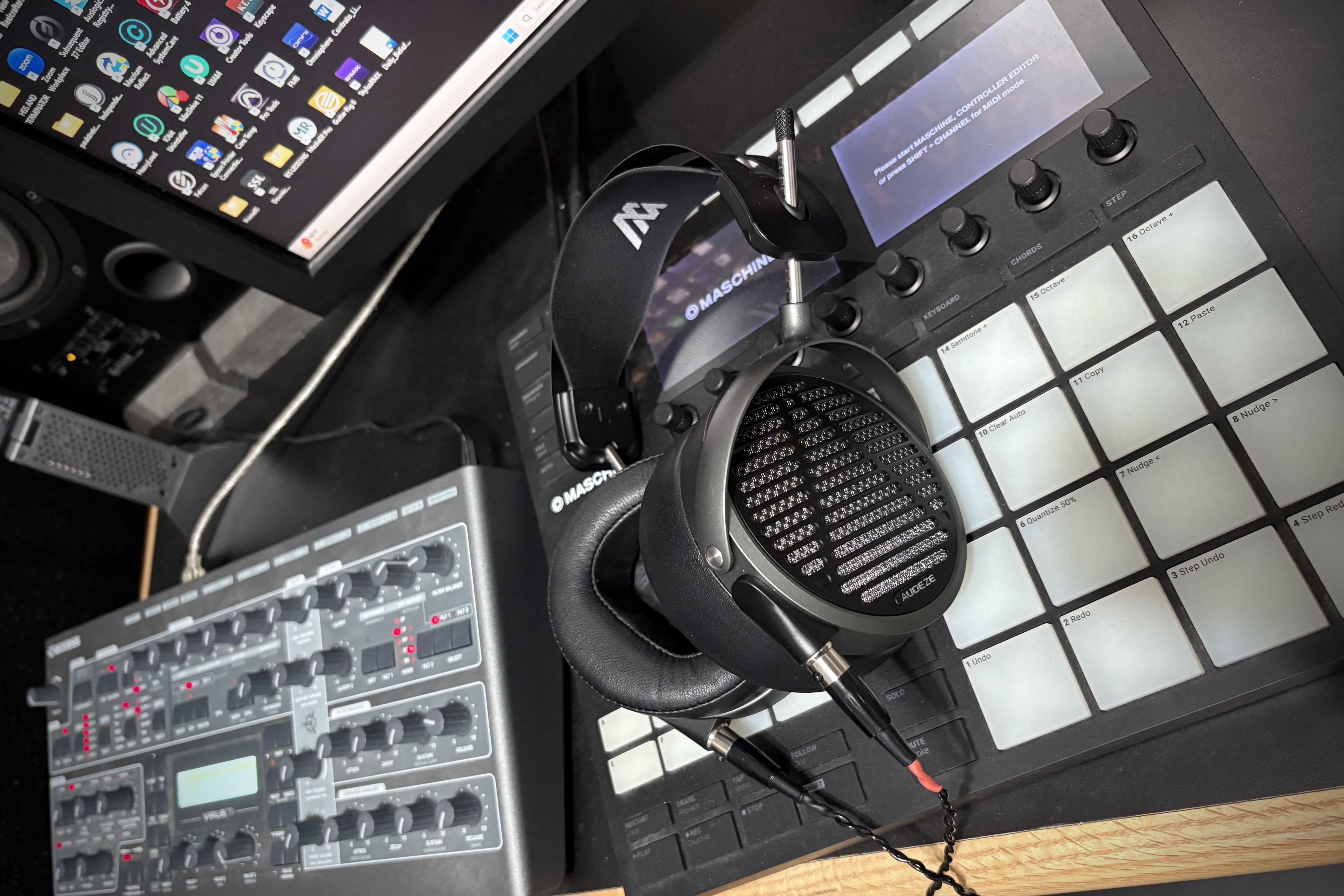Audeze MM-500 headphones laying on mixing board in the studio