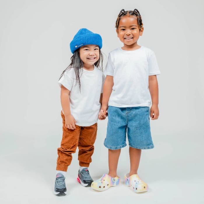 young boy and girl holding hands