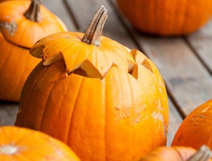 Pumpkins with lids cut off