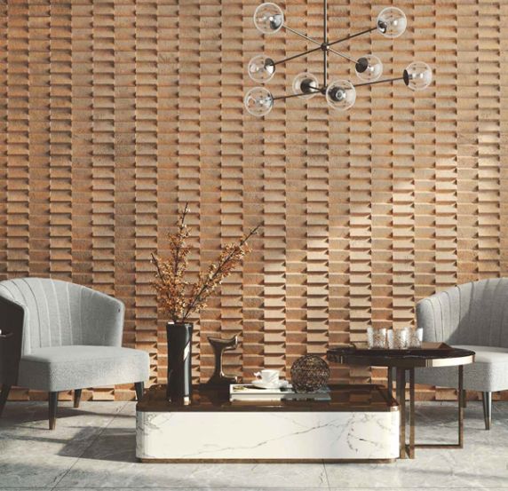 Modern living space with two chairs, coffee table, and decorative Krion fit wall.