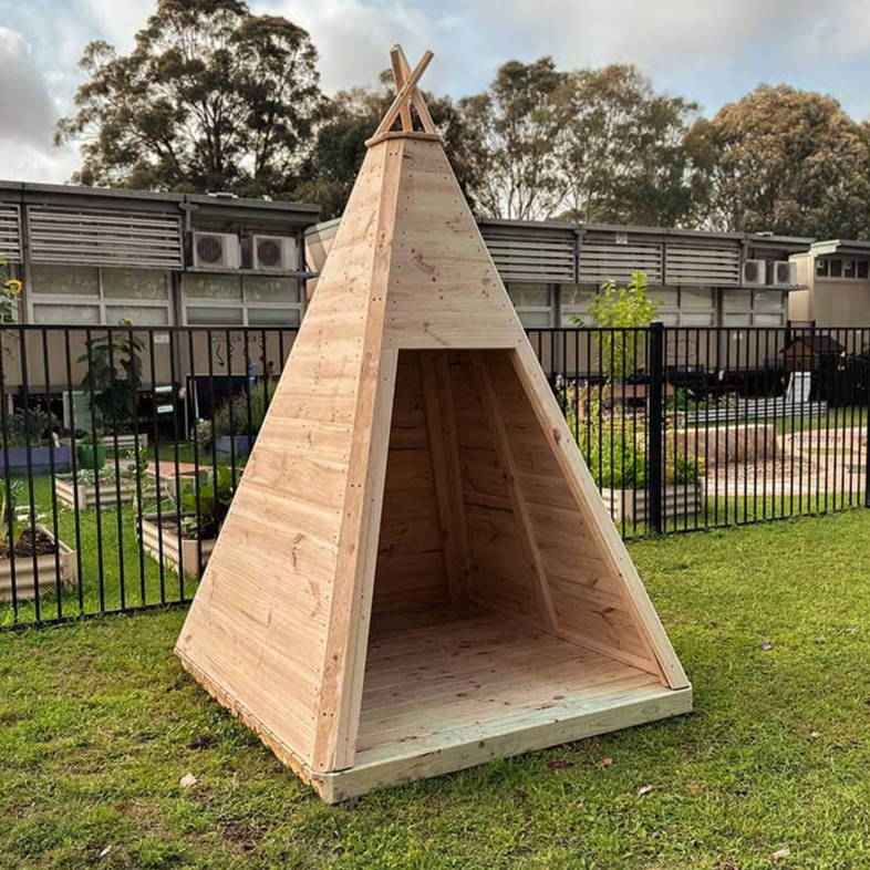 a wooden Tepee cubby house for schools
