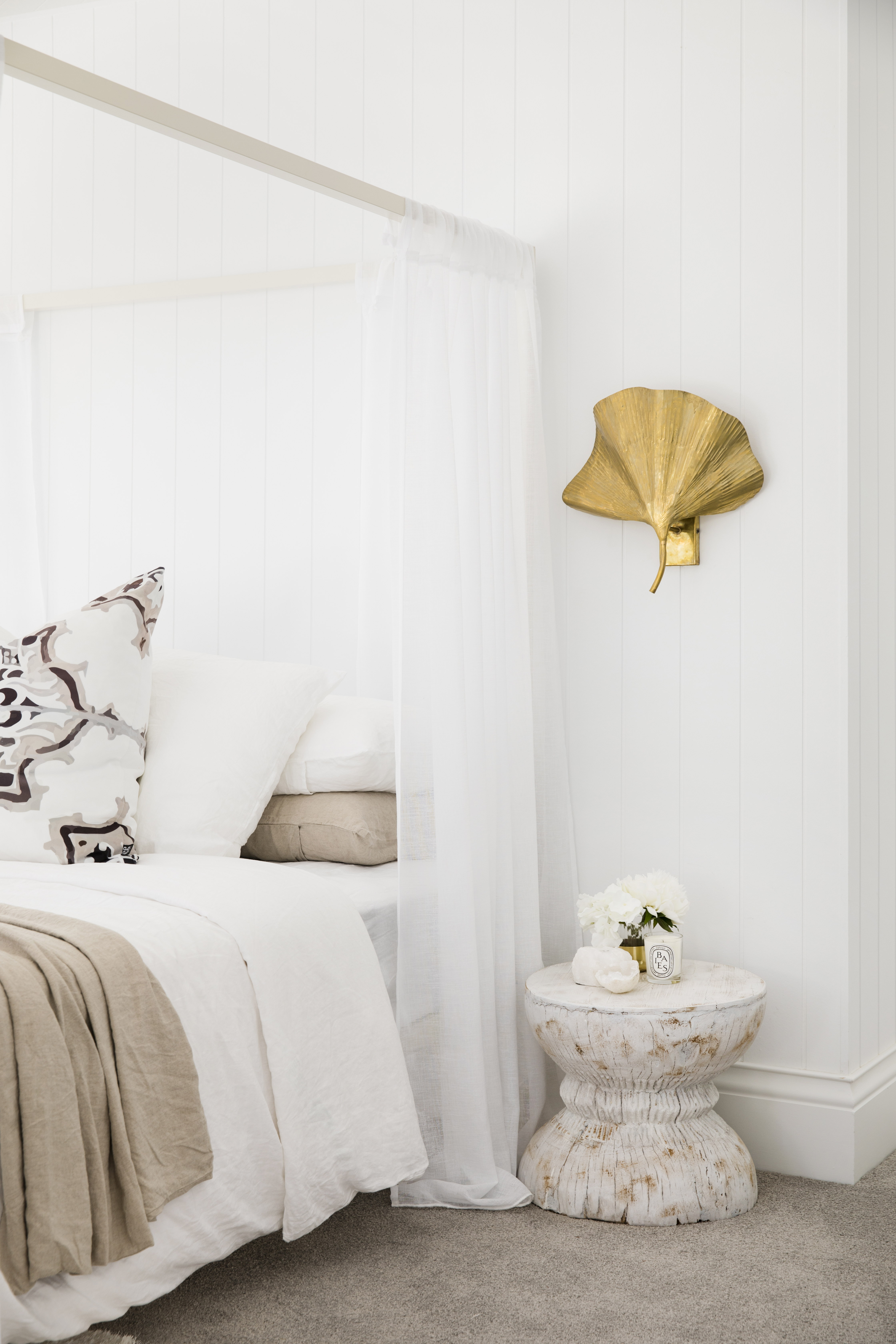 Gold Wall Light above bedside table