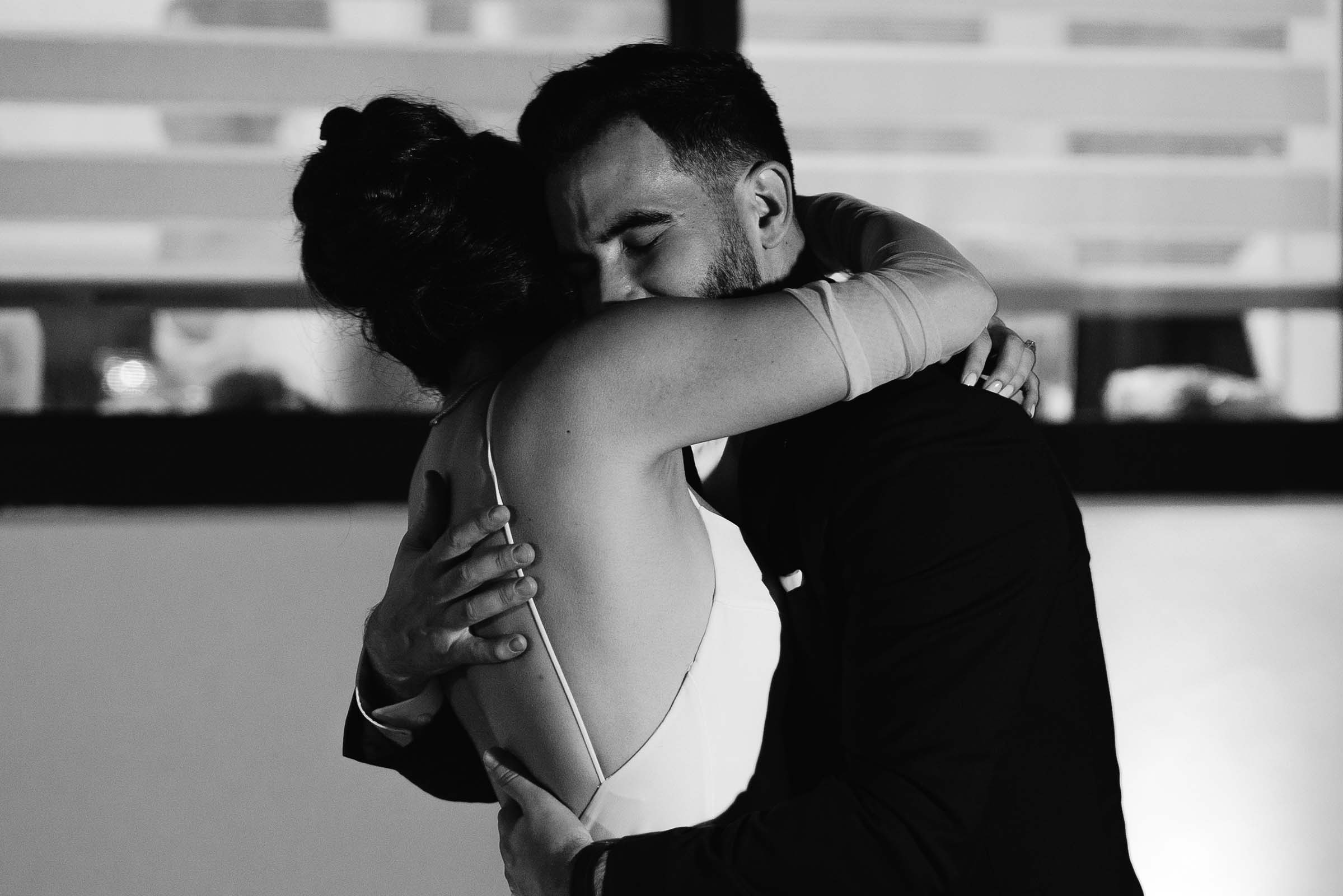 Bride and Groom holding each other