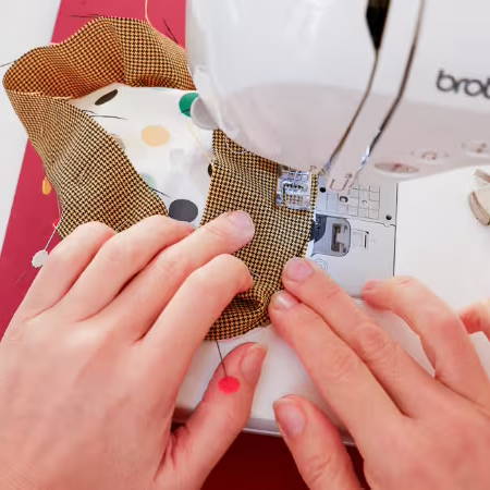 A project to sew fabric letters under a sewing machine