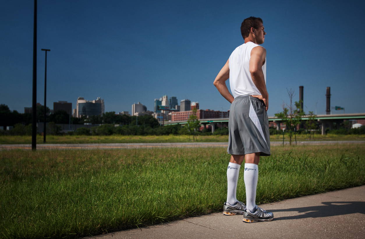 Man going on run, man exervising with Core-Sport compression socks on