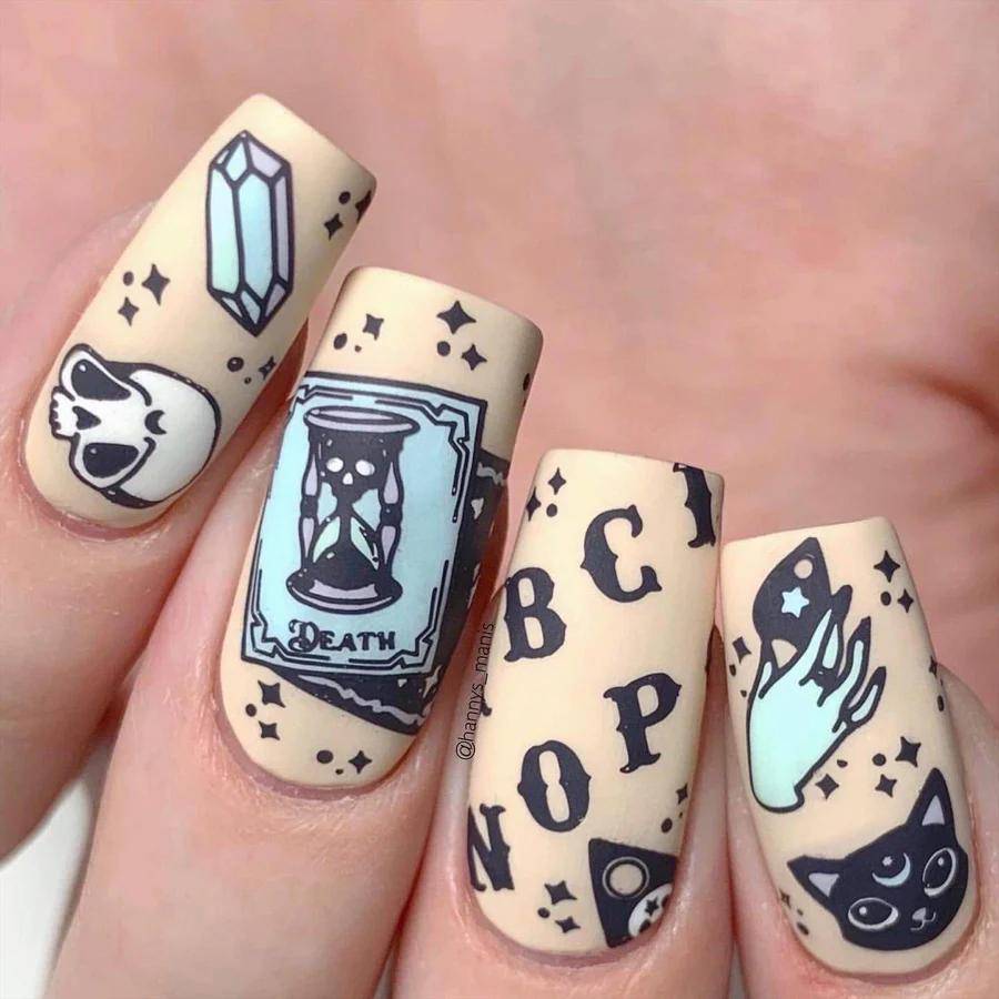 Change up classic french manicure with halloween nail art ideas like bloody french tips using dip powder and makeup sponge