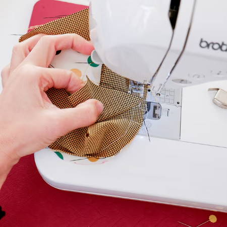 Finishing a seam for a fabric letter on a sewing machine