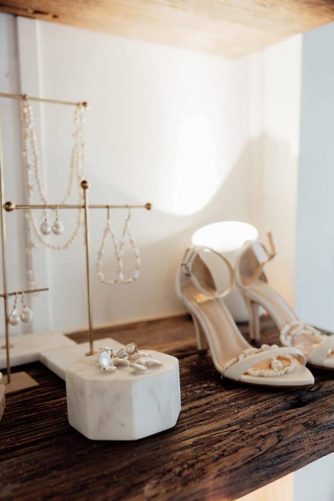  Grace Loves Lace Dosa heels with jewelry on marble display