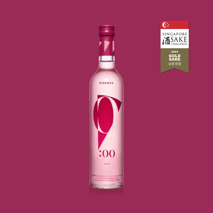 Bottle of pink sake on a maroon background with award badge.