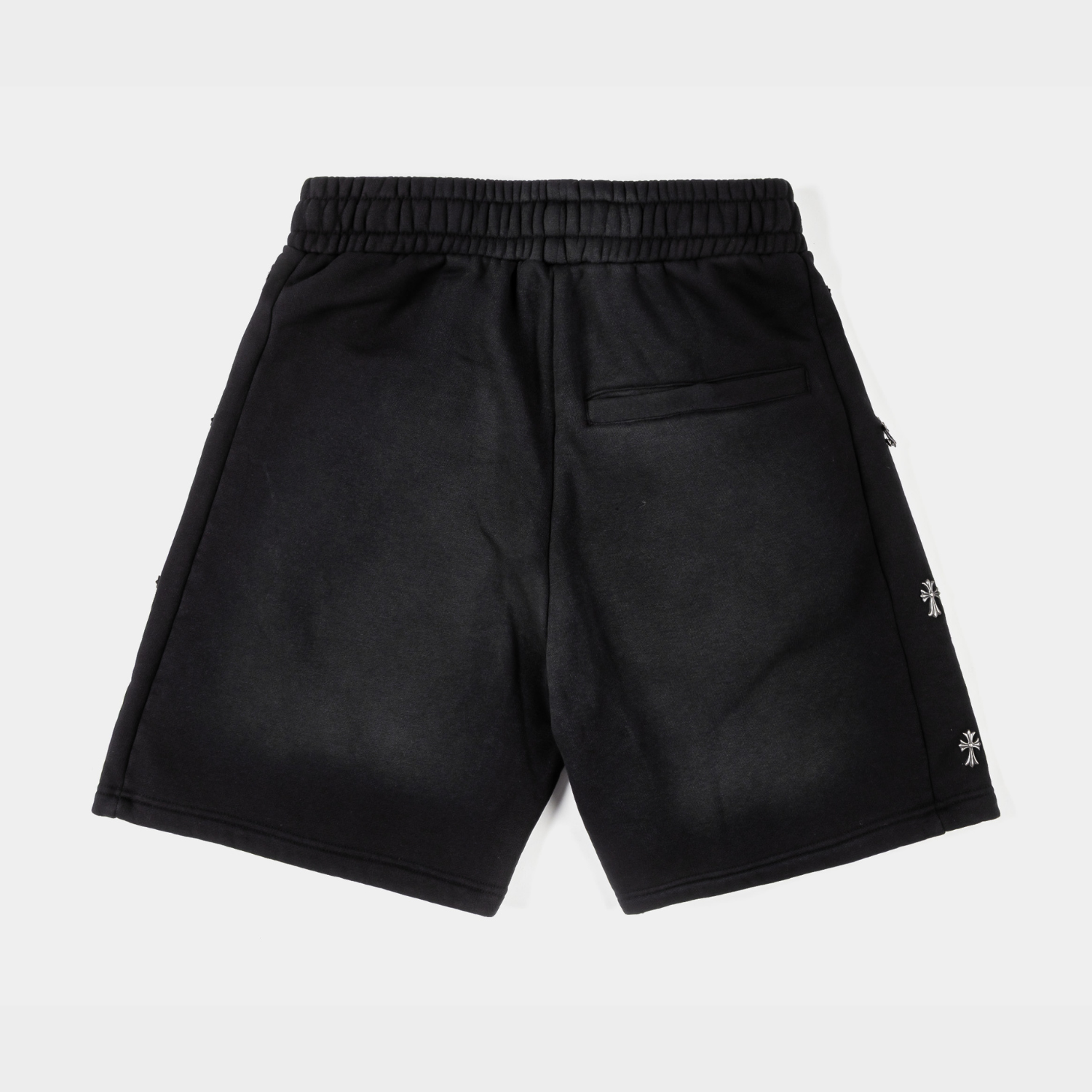 Black shorts with text: 