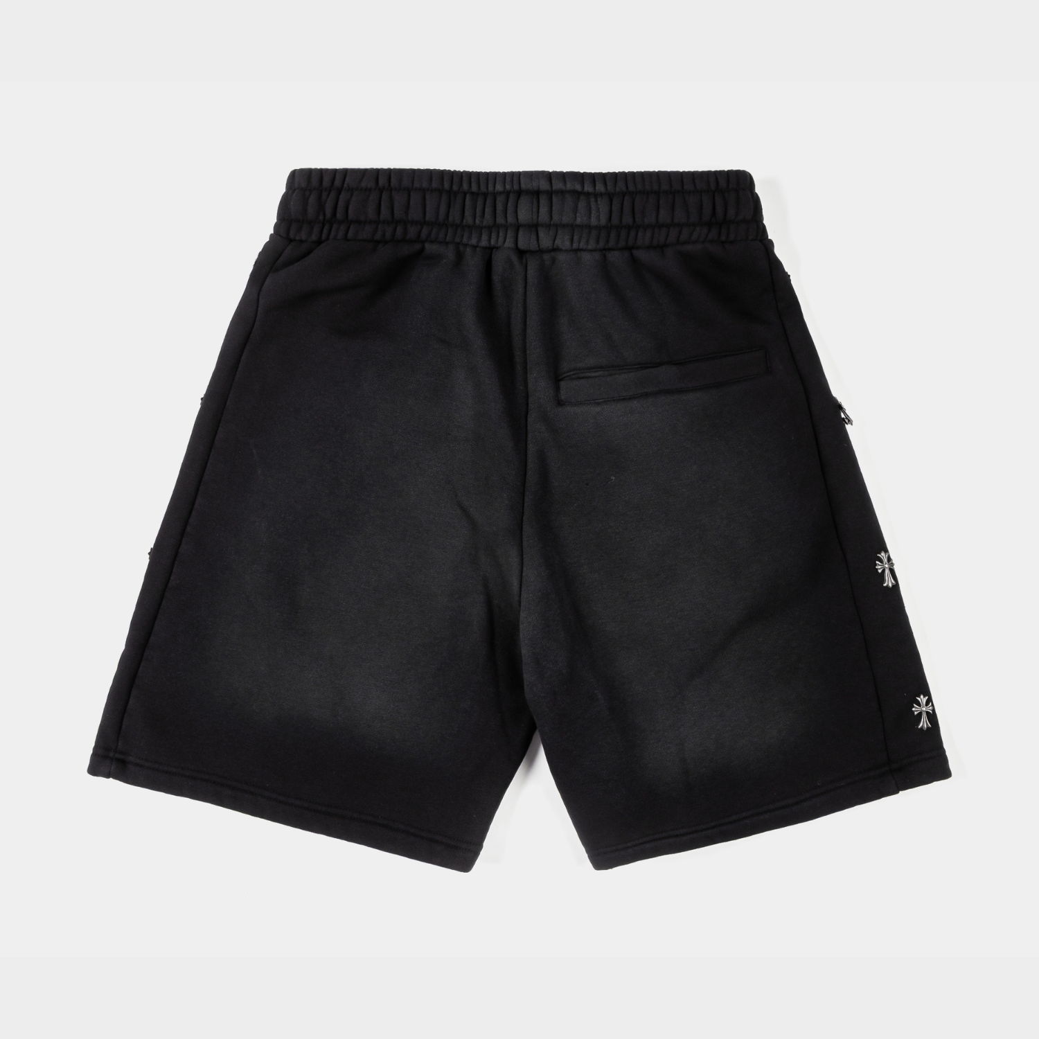Black shorts with text: 