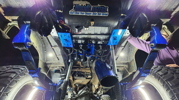 Underside rear view showing the air tank and horn setup mounted beneath Joseph's 1981 Chevy K30, install photo 2