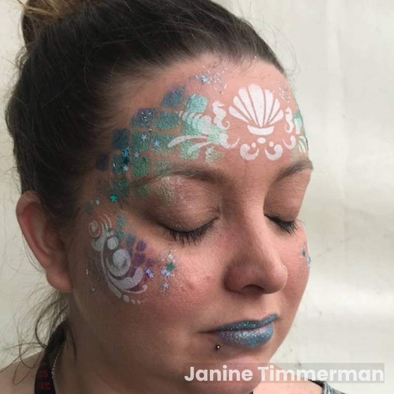 mermaid face paint design with stencil